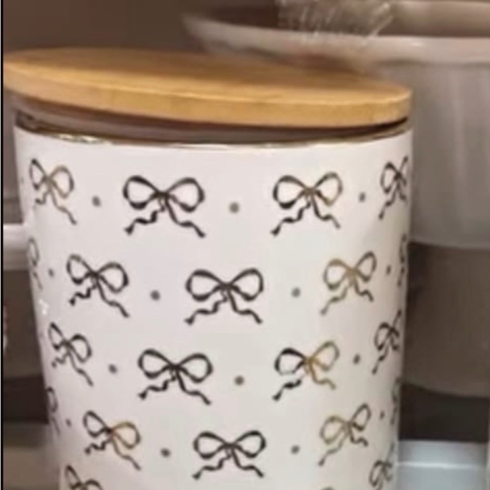 1 White Ceramic Canister with Black Bow Pattern and Wood Lid